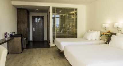 Sandy Beach Non Nuoc Resort Room Type - Premium Deluxe Twin Room with Balcony - Garden View Sandy Beach Non Nuoc Resort Room Type - Premium Deluxe Twin Room with Balcony - Garden View