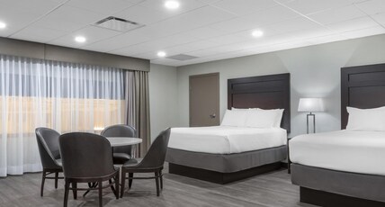 Best Western Plus Port O'Call Hotel Room Type - 2 Queen Beds, Non-Smoking, Murphy Bed, Work Desk, Microwave And Refrigerator