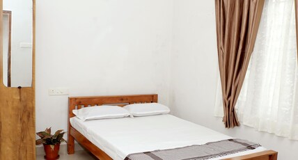 The Riverside Bliss Stays Room Type - Double Bed Room STD The Riverside Bliss Stays Room Type - Double Bed Room STD