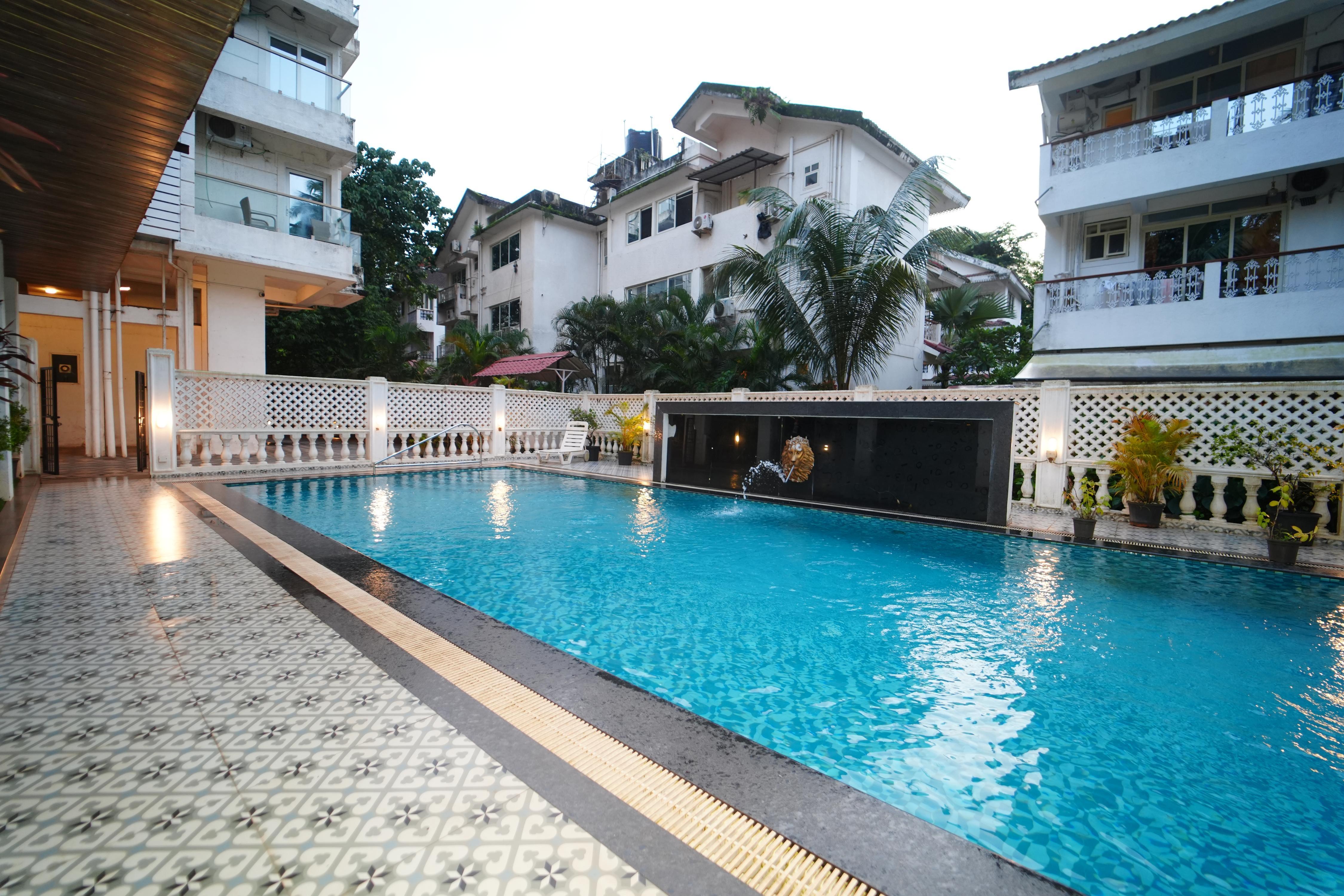Dishney Den - 1BHK -Hill view - pvt balcony Bar - Tap to explore photos
