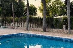 Ivory Estate 5 BHK Farm with pool by Under My Roof